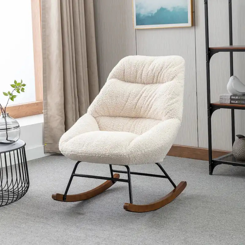 Fauteuil à bascule capitonné en tissu bouclé