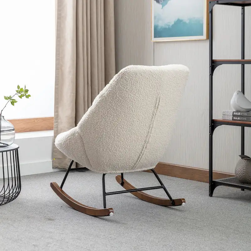 Fauteuil à bascule capitonné en tissu bouclé