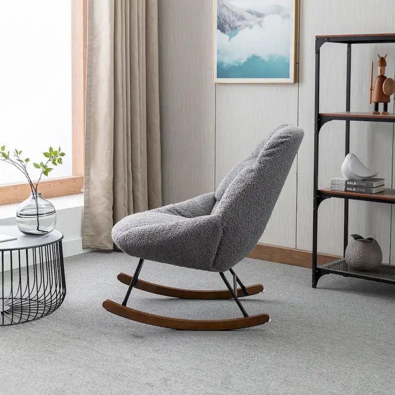 Fauteuil à bascule capitonné en tissu bouclé