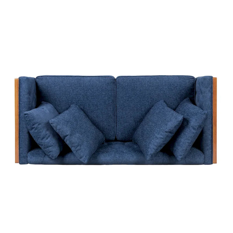 Causeuse capitonnée avec coussins décoratifs