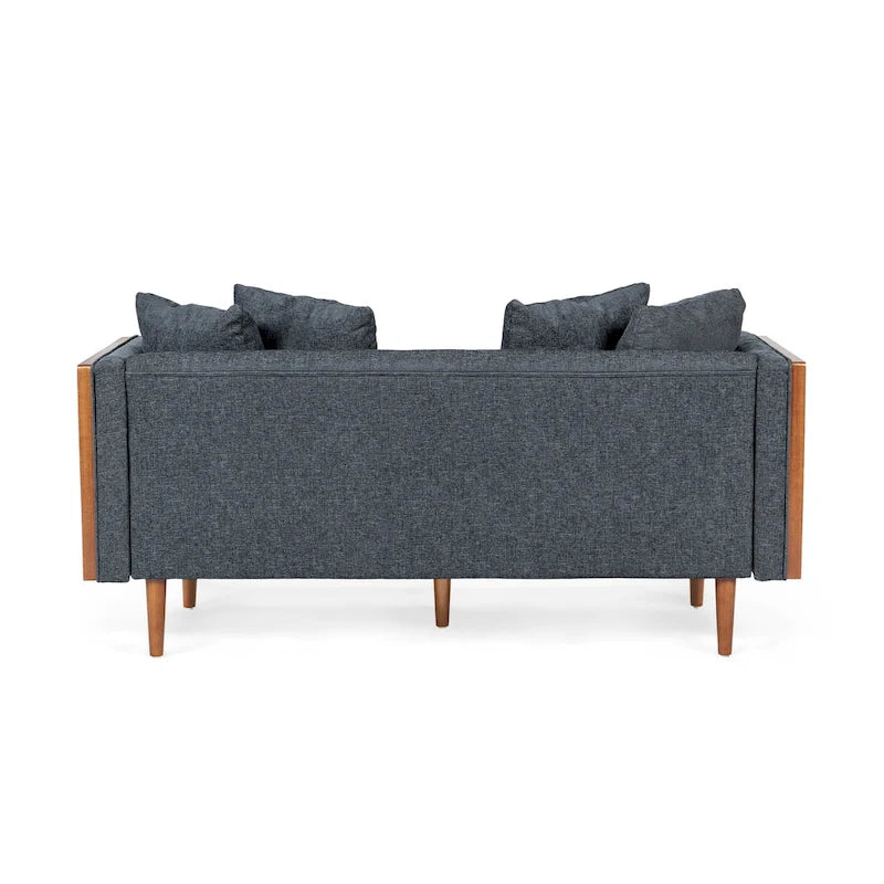 Causeuse capitonnée avec coussins décoratifs
